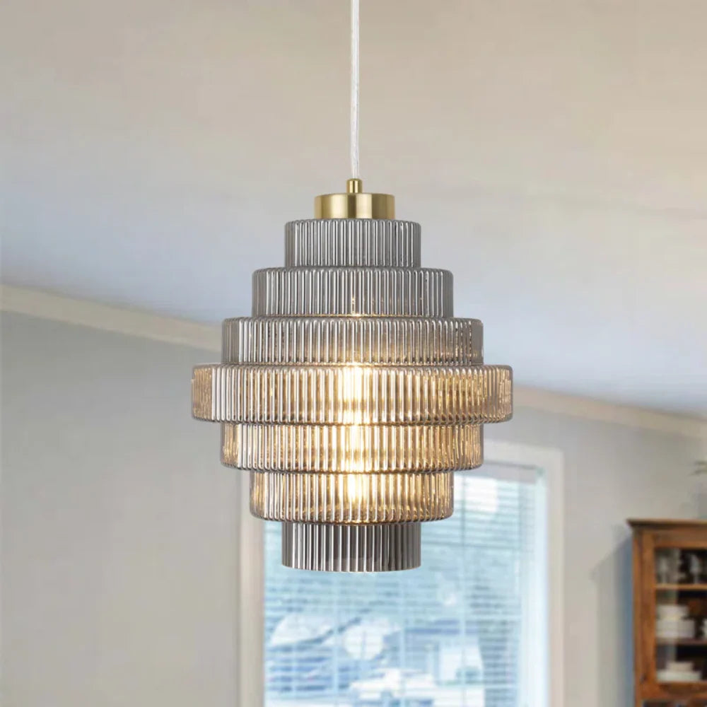 Elegant Carafe Glass Pendant Light With Brass Accents