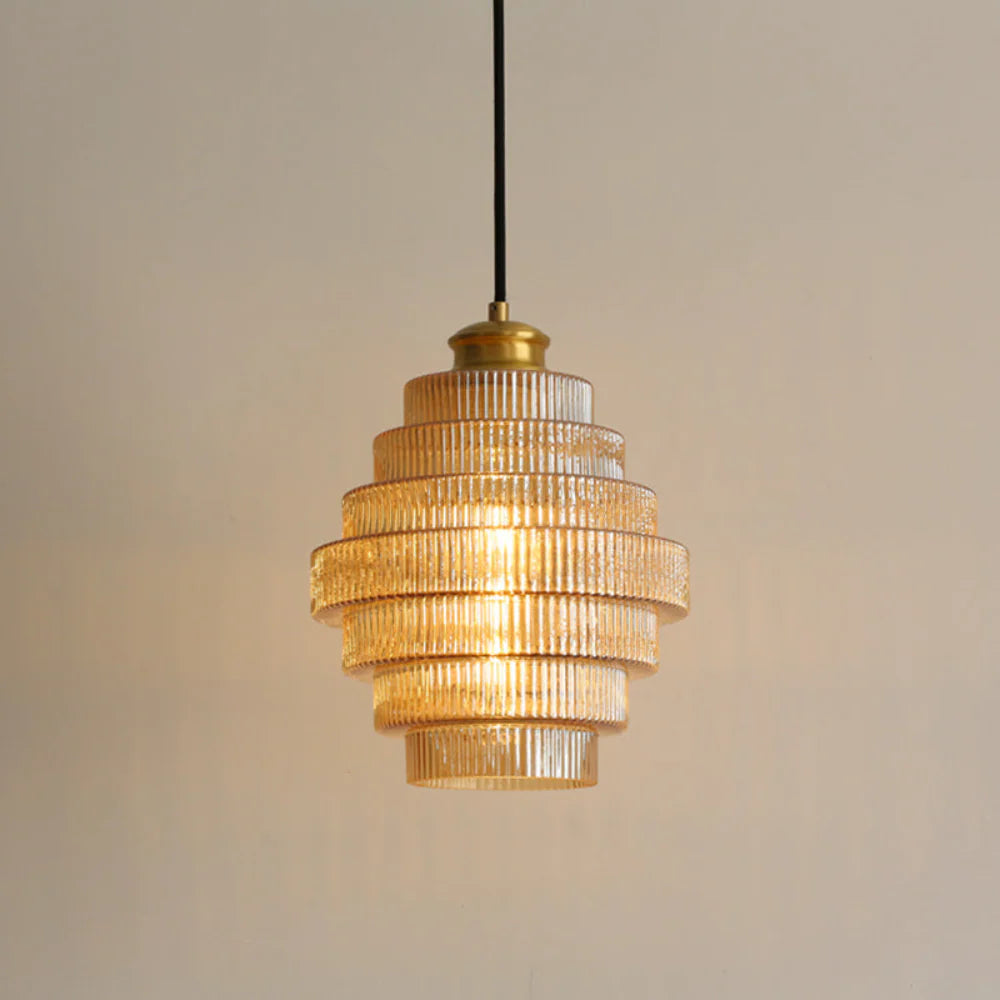 Elegant Carafe Glass Pendant Light With Brass Accents